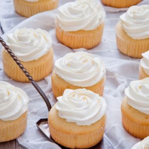vanilla cupcakes, homemade cupcakes, irresistible recipe, moist texture, golden perfection, luscious frosting, special occasion dessert, sweet tooth satisfaction