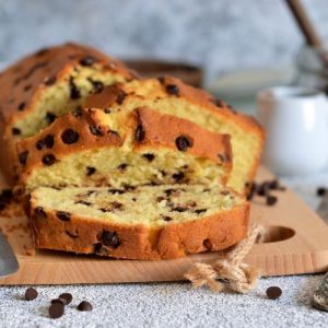 chocolate chip banana bread, ultimate banana bread recipe, moist and flavorful bread, easy banana bread, ripe bananas, luscious chocolate chips, foolproof recipe, comforting dessert, homemade bread, delicious banana bread, flavorful creation, easy-to-follow instructions, irresistible flavor combination, baking for beginners